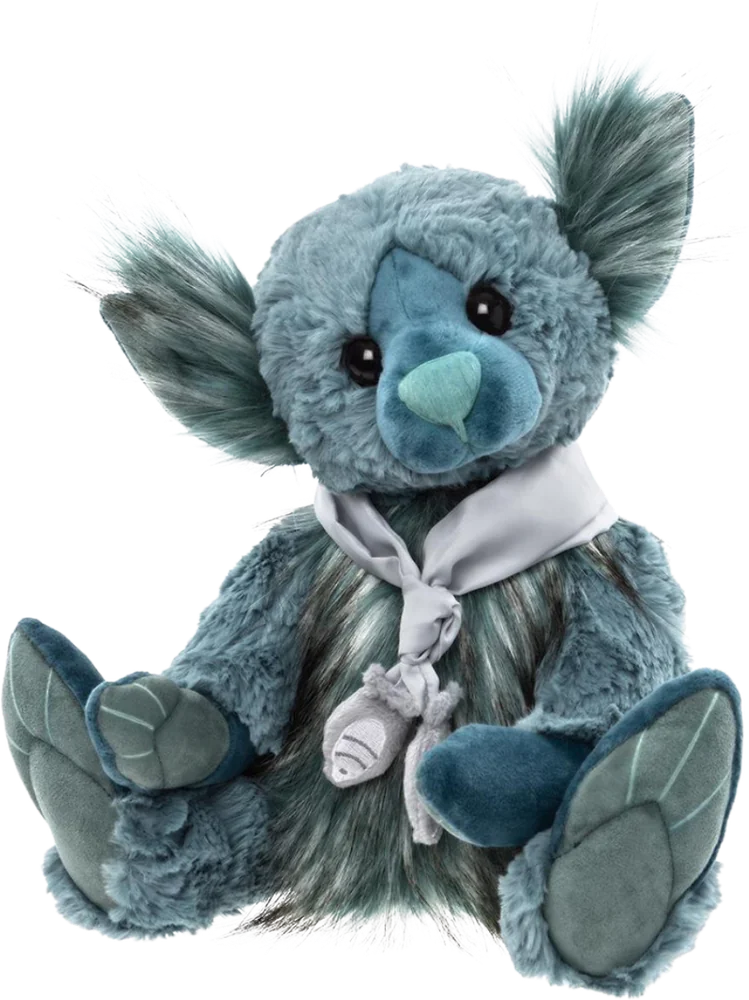 A Charlie Bears collectible teddy bear in soft blue-grey plush.
